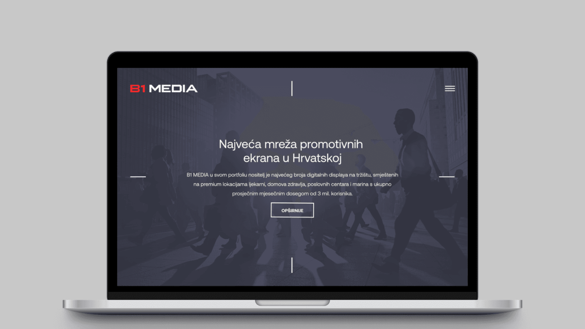b1 media homepage on a laptop mockup with a grey background