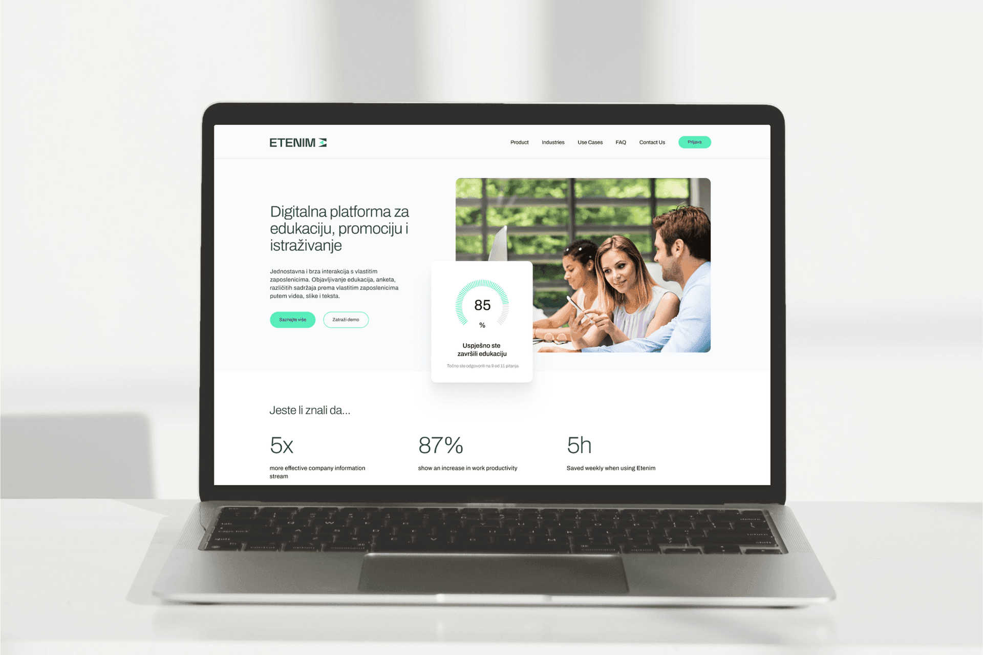 mockup of our Etenim solution homescreen on a laptop placed on a table in a white room